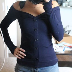 Off the shoulder sweater.